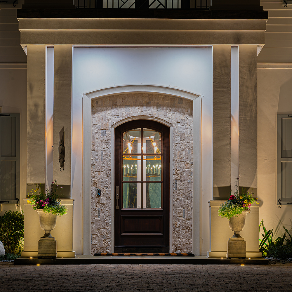 Mini Well Light used for in-grade uplighting near a landscape feature