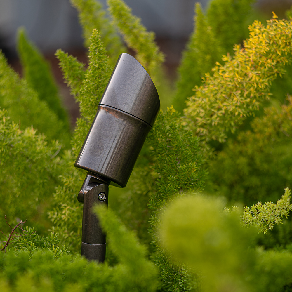 REV Spotlight uplighting a tree canopy
