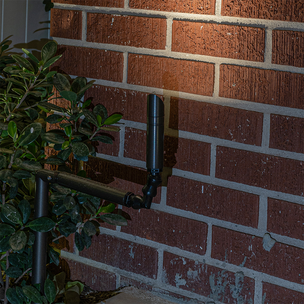 MS Mini Spotlight with Knuckle mounted near a brick wall for tight architectural accent lighting